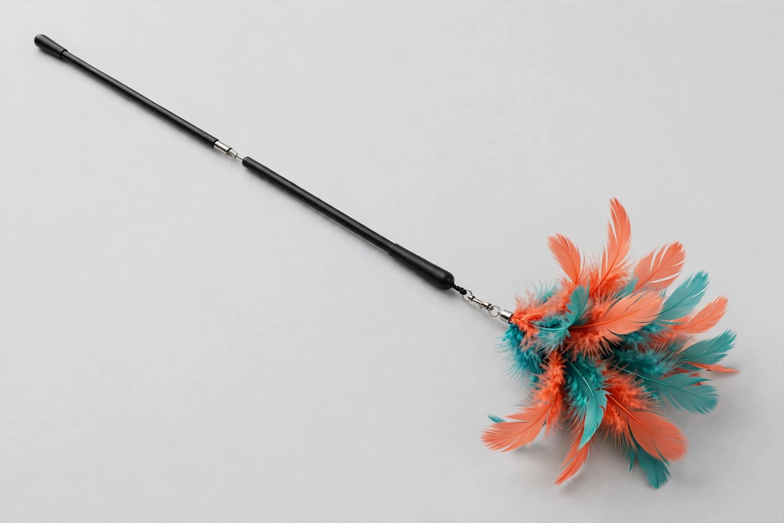Cat feather teaser wand with a two-piece pull-apart rod and swivel-mounted bright feather lure
