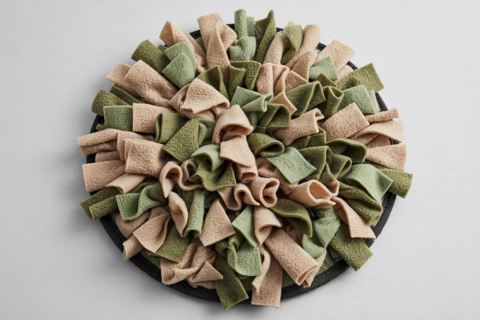 Dog snuffle mat with folded fleece fabric strips for treat foraging