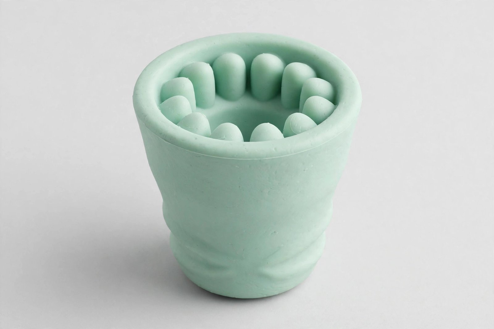 Mint green West Paw Toppl treat-dispensing dog toy, small size